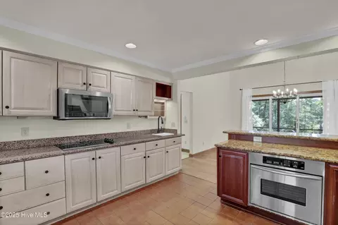 Kitchen - 605 Sawgrass Rd, Hampstead, NC 28443 photo 3 of 3