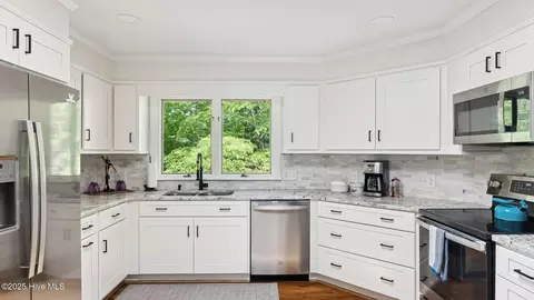 Kitchen - 145 Turtle Point Rd, Pinehurst, NC 28374 photo 2 of 3