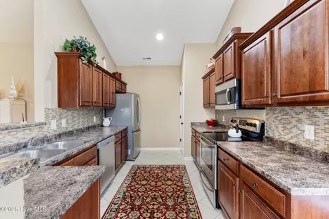 Kitchen - 209 Conifer Dr, Hampstead, NC 28443 photo 2 of 3