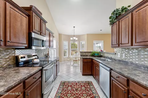 Kitchen - 209 Conifer Dr, Hampstead, NC 28443 photo 3 of 3