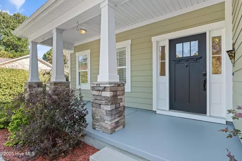 Exterior - 557 Button Bush Ln, Hampstead, NC 28443 photo 3 of 9