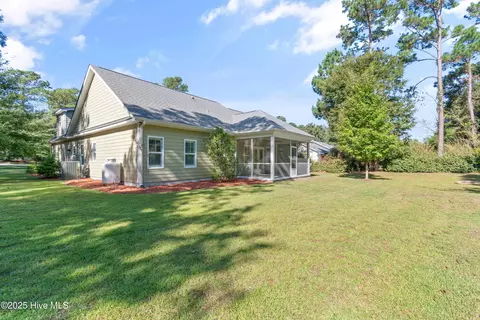 Exterior - 557 Button Bush Ln, Hampstead, NC 28443 photo 7 of 9