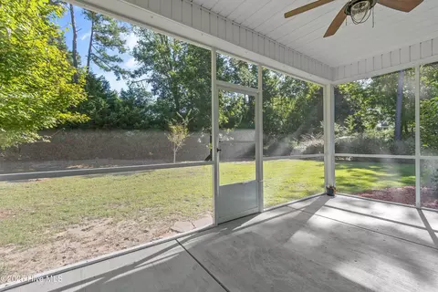 Exterior - 557 Button Bush Ln, Hampstead, NC 28443 photo 5 of 9