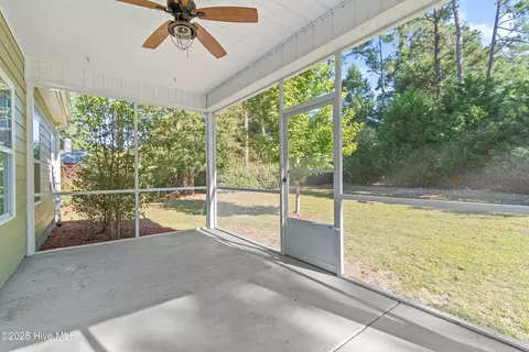 Exterior - 557 Button Bush Ln, Hampstead, NC 28443 photo 4 of 9