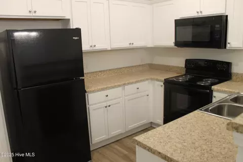 Kitchen - 301 E Goodman St, Fair Bluff, NC 28439 photo 5 of 5