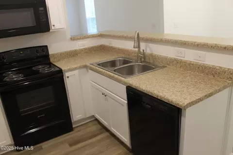 Kitchen - 301 E Goodman St, Fair Bluff, NC 28439 photo 4 of 5