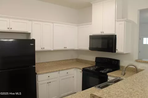 Kitchen - 301 E Goodman St, Fair Bluff, NC 28439 photo 2 of 5