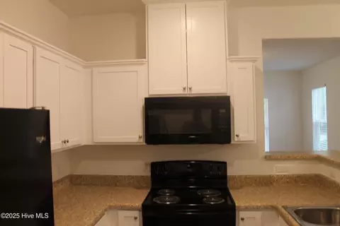 Kitchen - 301 E Goodman St, Fair Bluff, NC 28439 photo 3 of 5