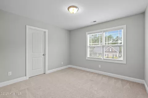Bedroom - 104 Treasure Way, Hampstead, NC 28443 photo 1 of 7
