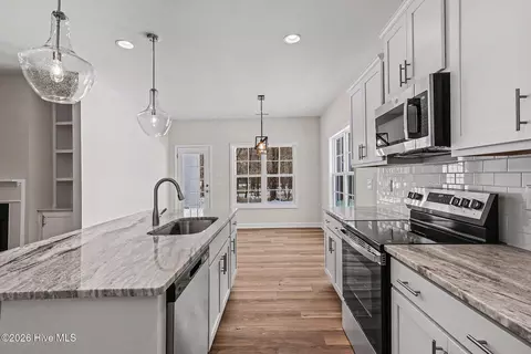 Kitchen - 207 Tuskeegee Dr, Smithfield, NC 27577 photo 3 of 4