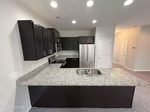 Kitchen - 84 Aspen Rd, Hampstead, NC 28443 photo 2 of 2