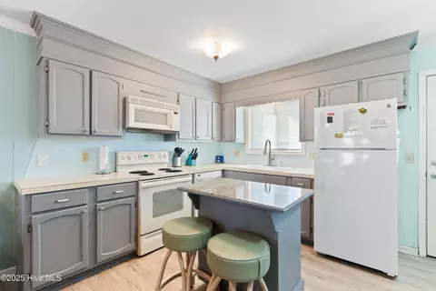 Kitchen - 447 E 2nd St #E17, Ocean Isle Beach, NC 28469 photo 2 of 2