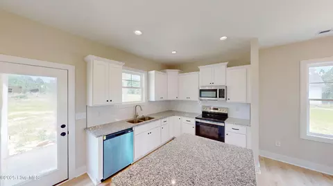 Kitchen - 131 Spring Meadows Dr, Aberdeen, NC 28315 photo 2 of 2