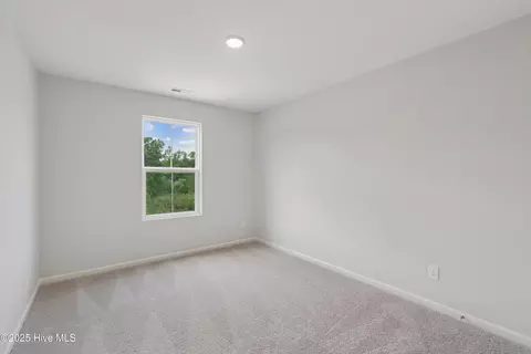 Bedroom - 17 E Farley Dr #70, Hampstead, NC 28443 photo 7 of 8