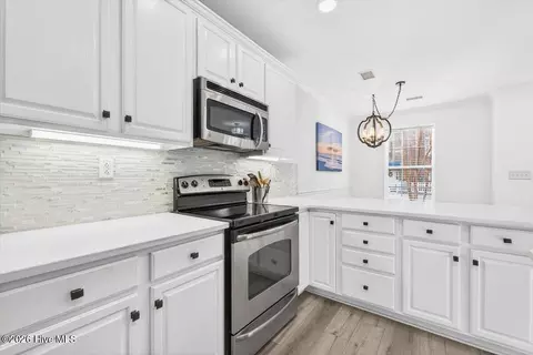 Kitchen - 7640 Front St UNIT 2, Sunset Beach, NC 28468 photo 4 of 5