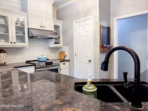 Kitchen - 329 Long Leaf Dr, Hampstead, NC 28443 photo 9 of 13