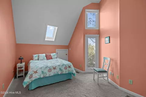 Bedroom - 214 Sandfiddler E, Emerald Isle, NC 28594 photo 3 of 5