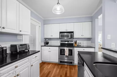 Kitchen - 214 Sandfiddler E, Emerald Isle, NC 28594 photo 2 of 4