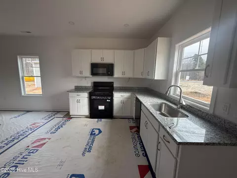 Kitchen - 505 Bartley St, Vass, NC 28394 photo 2 of 2