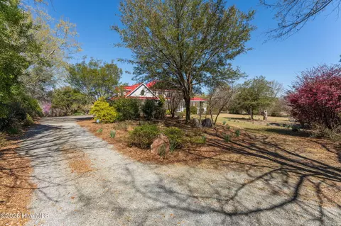 Exterior - 2689 Sloop Point Loop Rd, Hampstead, NC 28443 photo 16 of 44