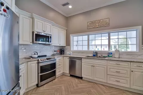Kitchen - 949 Forest Pointe Dr, Sunset Beach, NC 28468 photo 8 of 8