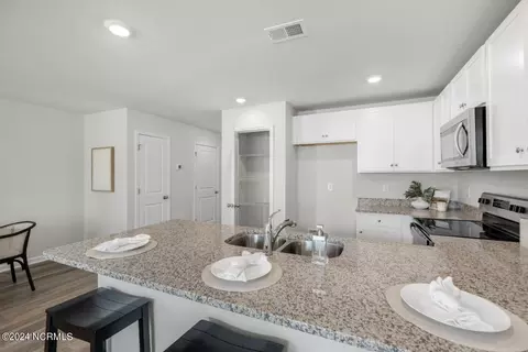 Kitchen - 5812 Harebell Rd UNIT 206, Leland, NC 28451 photo 2 of 2
