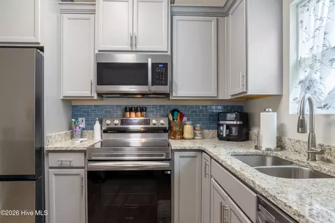Kitchen - 7605 Privateer Loop, Sunset Beach, NC 28468 photo 2 of 2