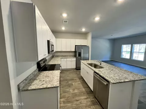 Kitchen - 230 Ladyfish Loop NW, Sunset Beach, NC 28468 photo 1 of 2