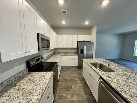 Kitchen - 230 Ladyfish Loop NW, Sunset Beach, NC 28468 photo 2 of 2