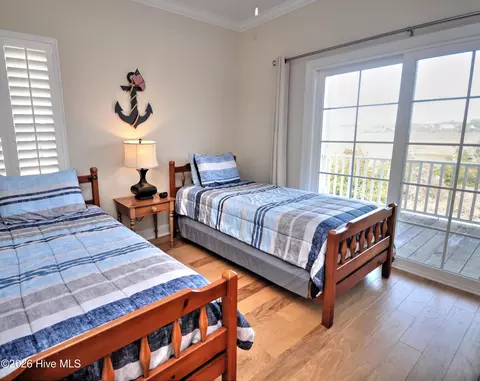 Bedroom - 273 E Second St, Ocean Isle Beach, NC 28469 photo 8 of 10