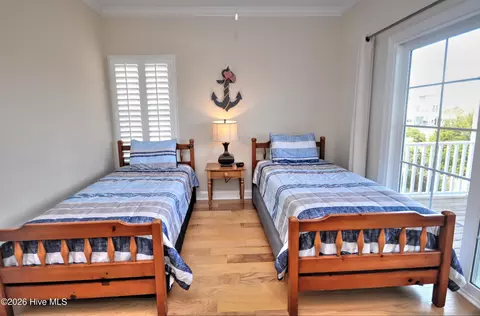 Bedroom - 273 E Second St, Ocean Isle Beach, NC 28469 photo 9 of 10