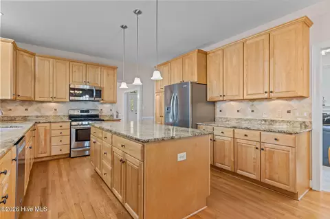 Kitchen - 121 Oakleaf Dr, Pine Knoll Shores, NC 28512 photo 3 of 4