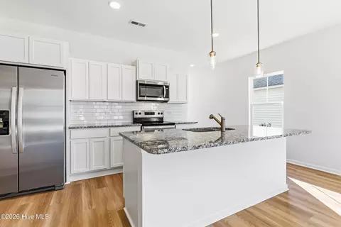 Kitchen - 32 E Farley Rd #64, Hampstead, NC 28443 photo 2 of 2