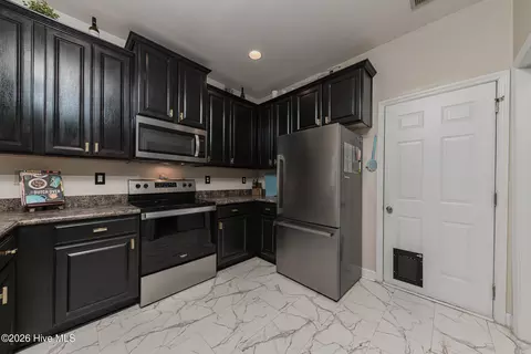 Kitchen - 101 Boysenberry Fields Rd, Maple Hill, NC 28454 photo 4 of 5