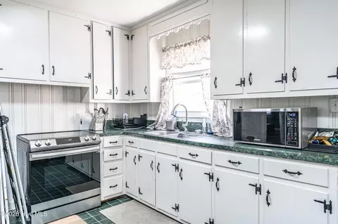 Kitchen - 307 5th St, Hamlet, NC 28345 photo 1 of 4
