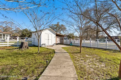 Exterior - 219 Shoreline Dr E, Sunset Beach, NC 28468 photo 6 of 10