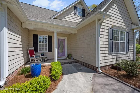 Exterior - 229 Doral Dr, Hampstead, NC 28443 photo 4 of 14
