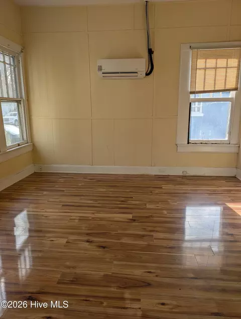 Living - 406 Academy St E, Wilson, NC 27893 photo 2 of 3