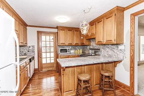 Kitchen - 214 E Nash St, Spring Hope, NC 27882 photo 1 of 2