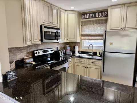 Kitchen - 5 Pine Tree Rd # 119, Pinehurst, NC 28374 photo 3 of 3