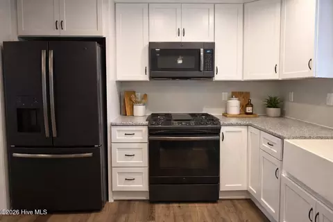 Kitchen - 155 Savannah Ave, Grandy, NC 27939 photo 2 of 2