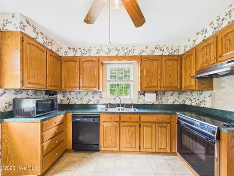 Kitchen - 409 Myrtle Ave, Hamlet, NC 28345 photo 1 of 2