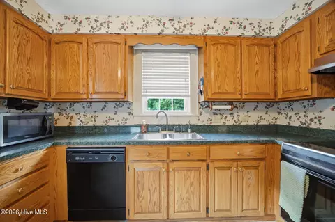 Kitchen - 409 Myrtle Ave, Hamlet, NC 28345 photo 2 of 2