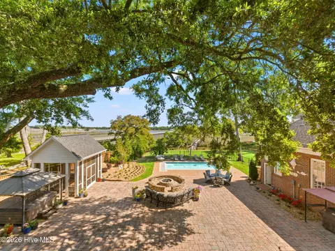 Exterior - 404 Shoreline Dr E, Sunset Beach, NC 28468 photo 5 of 18