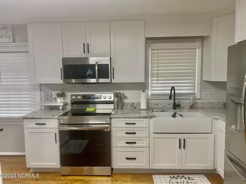 Kitchen - 166 Pine Tree Ln, Chadbourn, NC 28431 photo 7 of 9