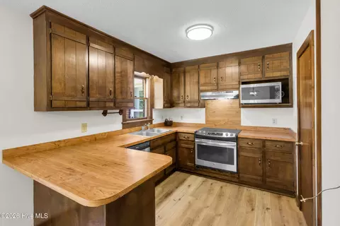 Kitchen - 720 Poplar St, Faison, NC 28341 photo 1 of 2