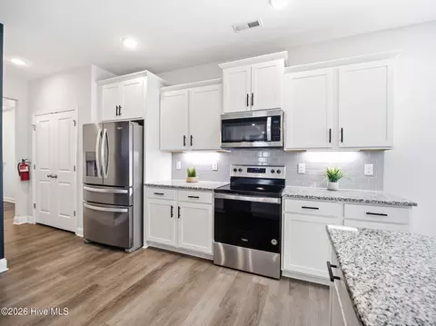 Kitchen - 1011 E Arboria Dr, Hampstead, NC 28443 photo 7 of 7