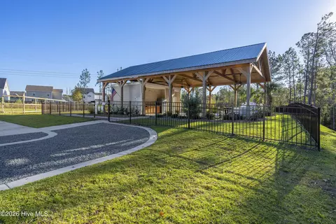 Exterior - 1011 E Arboria Dr, Hampstead, NC 28443 photo 19 of 24