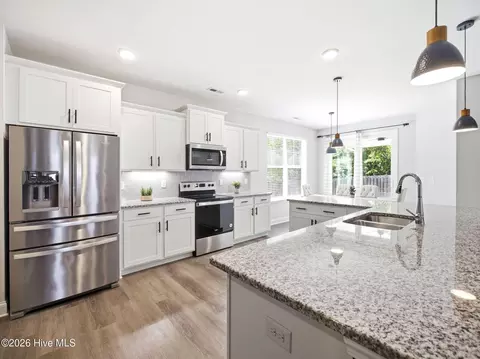 Kitchen - 1011 E Arboria Dr, Hampstead, NC 28443 photo 6 of 7