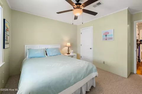 Bedroom - 105 E Main St, Sunset Beach, NC 28468 photo 2 of 8